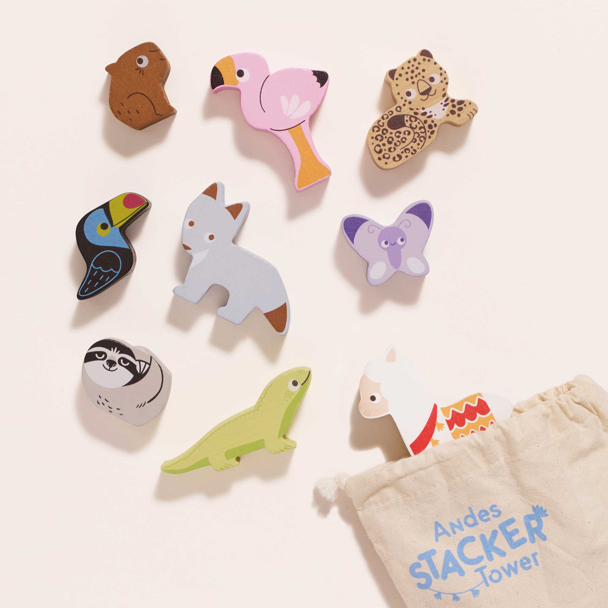 PL113-andes-stacking-wooden-toy-animals-cotton-bag-plastic-free-flamingo-lama-wolf-butterfly-tucan-leopard-lizard-wolf-pink-soft